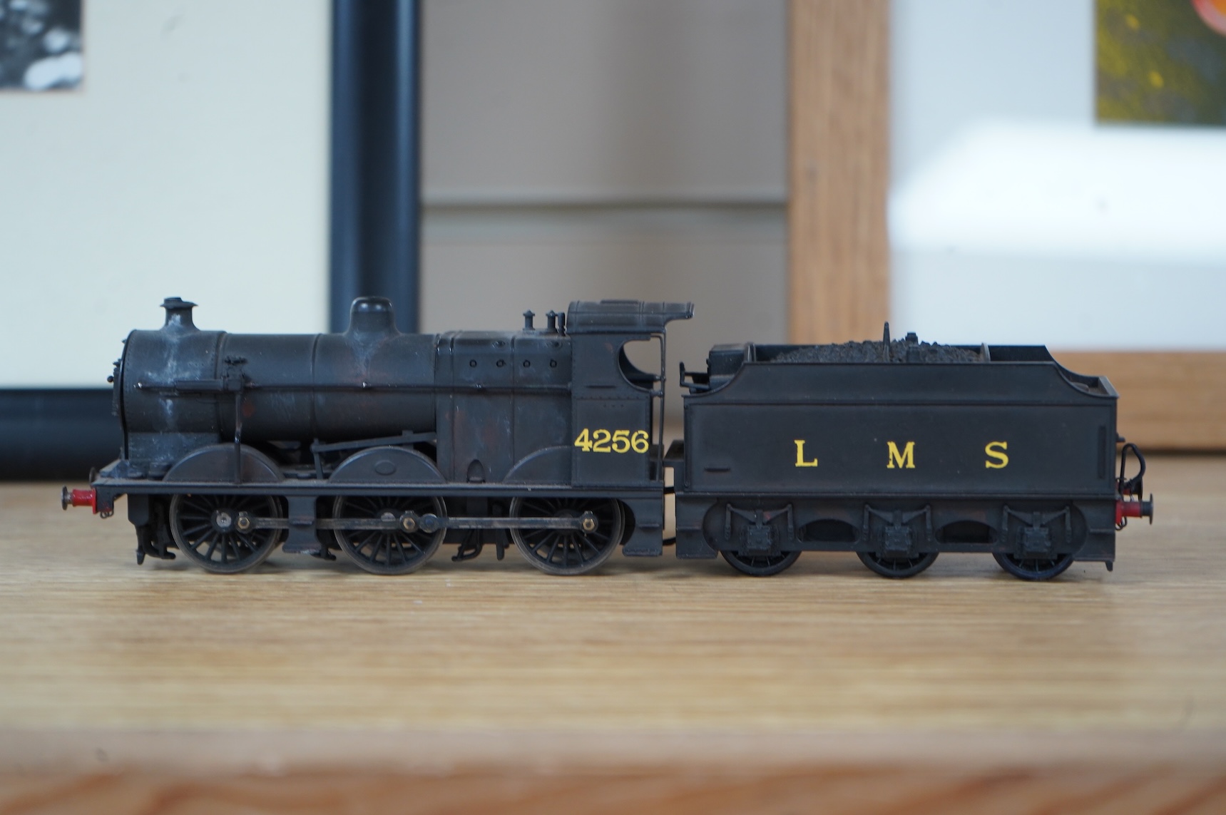 Two kit built and adapted EM gauge LMS railway locomotives; an 0-8-0, 9518, and an 0-6-0 class 4F based on an Airfix kit, together with the body only of an SR Schools Class